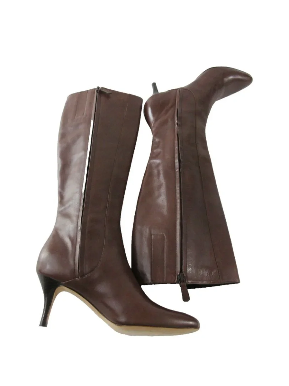 Cole Haan boots shown